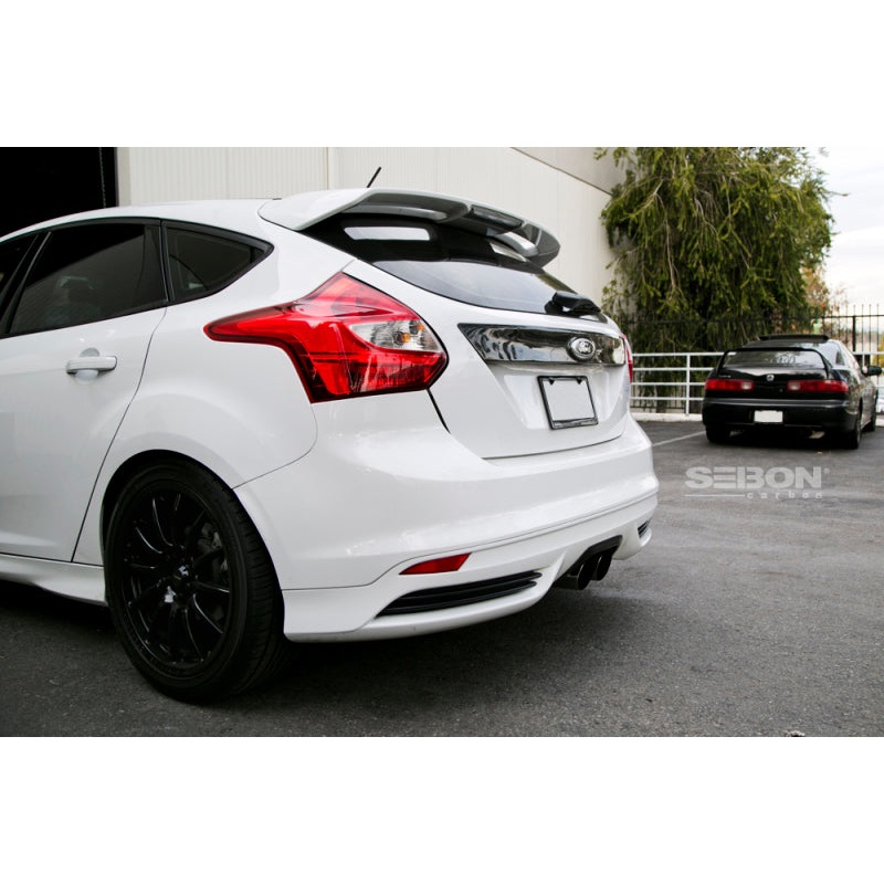 Seibon 12-13 Ford Focus 4 Door Carbon Fiber Tail Garnish